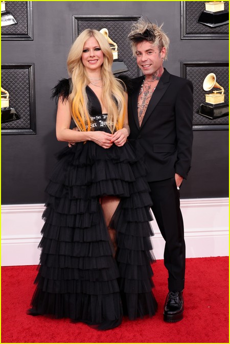 Avril Lavigne and Mod Sun on the Grammys 2022 red carpet