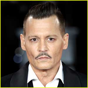 Johnny Depp Goes Viral for What He Handed His Attorney During His Trial - See It Here