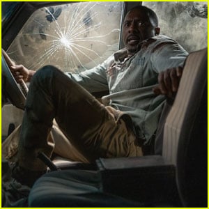 Idris Elba Runs From Killer Lion in First 'Beast' Trailer - Watch Now!