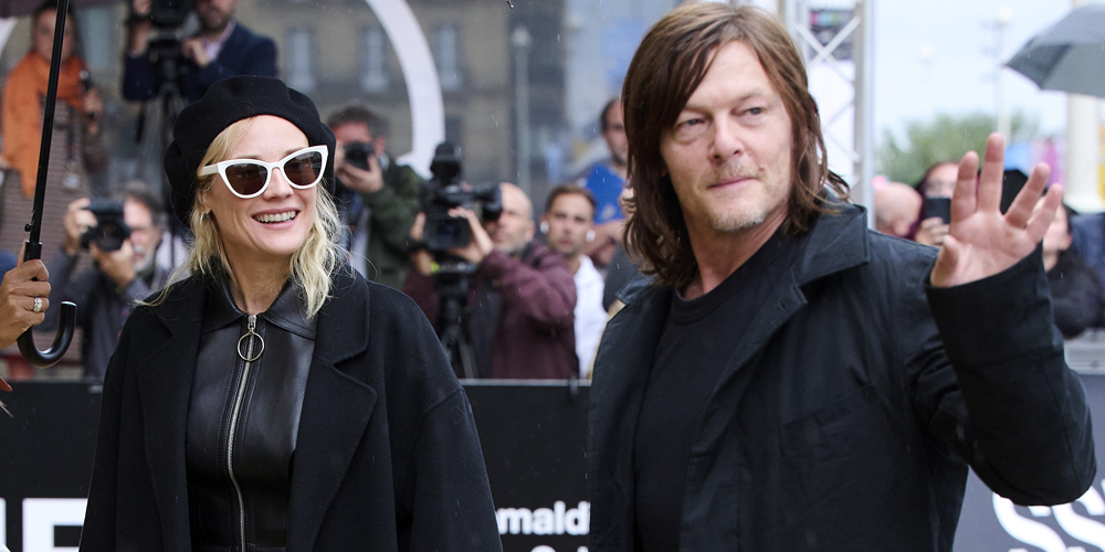 Diane Kruger Meets Fans In The Rain After Arriving in Spain with Norman Reedus