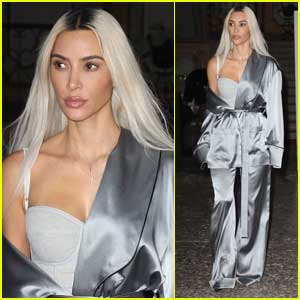 Kim Kardashian Wears Silver Satin Outfit While Leaving Photo Shoot in Milan