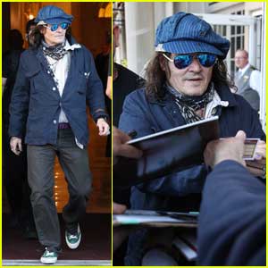 Johnny Depp is Greeted by Fans While Stepping Out in Boston
