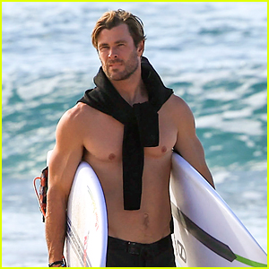 Chris Hemsworth's Back Muscles Are Looking Ripped in New Shirtless Beach Photos