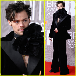 Harry Styles Wears Black Suit With Giant Black Flower Necklace to BRIT Awards 2023