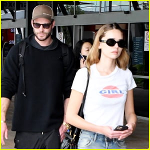 Liam Hemsworth & Girlfriend Gabriella Brooks Land in Australia as Miley Cyrus Tops the Charts a Third Week with 'Flowers'