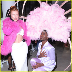 Lil Nas X Wears Giant Pink Feathered Headpiece to Christian Cowan Fashion Show