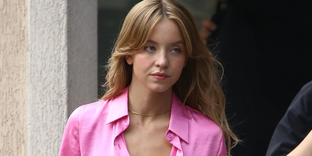 Sydney Sweeney Gets Covered By Giant Umbrellas While Shooting Top