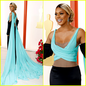 E! Host Laverne Cox Wows with Bright Blue Train on Oscars 2023 Red Carpet