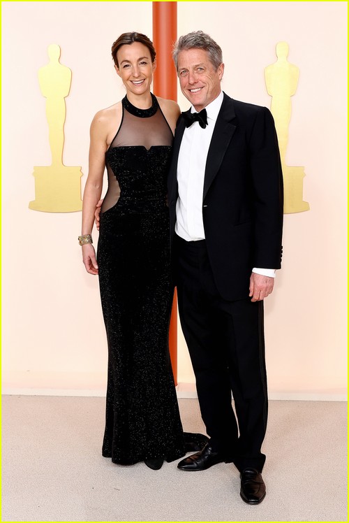 Hugh Grant and wife Anna Eberstein on the Oscars 2023 red carpet