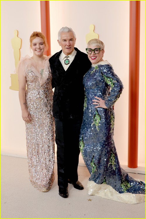 Elvis director Baz Luhrmann and costume designer Catherine Martin with their daughter Lillian on the Oscars 2023 red carpet