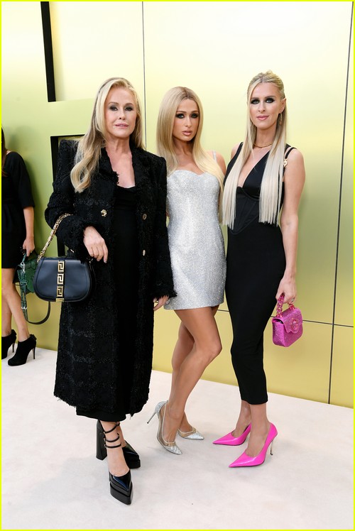 Paris Hilton, Nicky Hilton, and Kathy Hilton at the Versace fashion show in Los Angeles