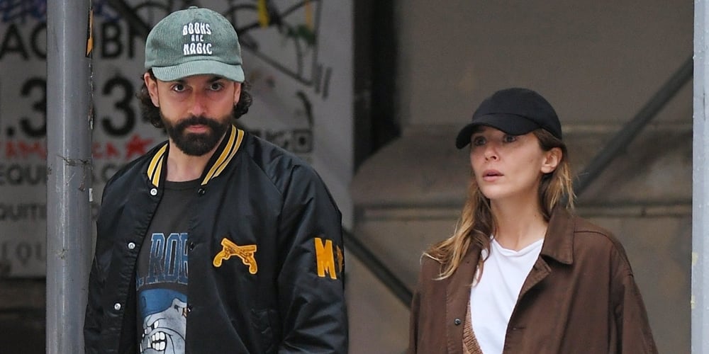 Elizabeth Olsen & Husband Robbie Arnett Go for a Stroll Together in the NYC Rain!