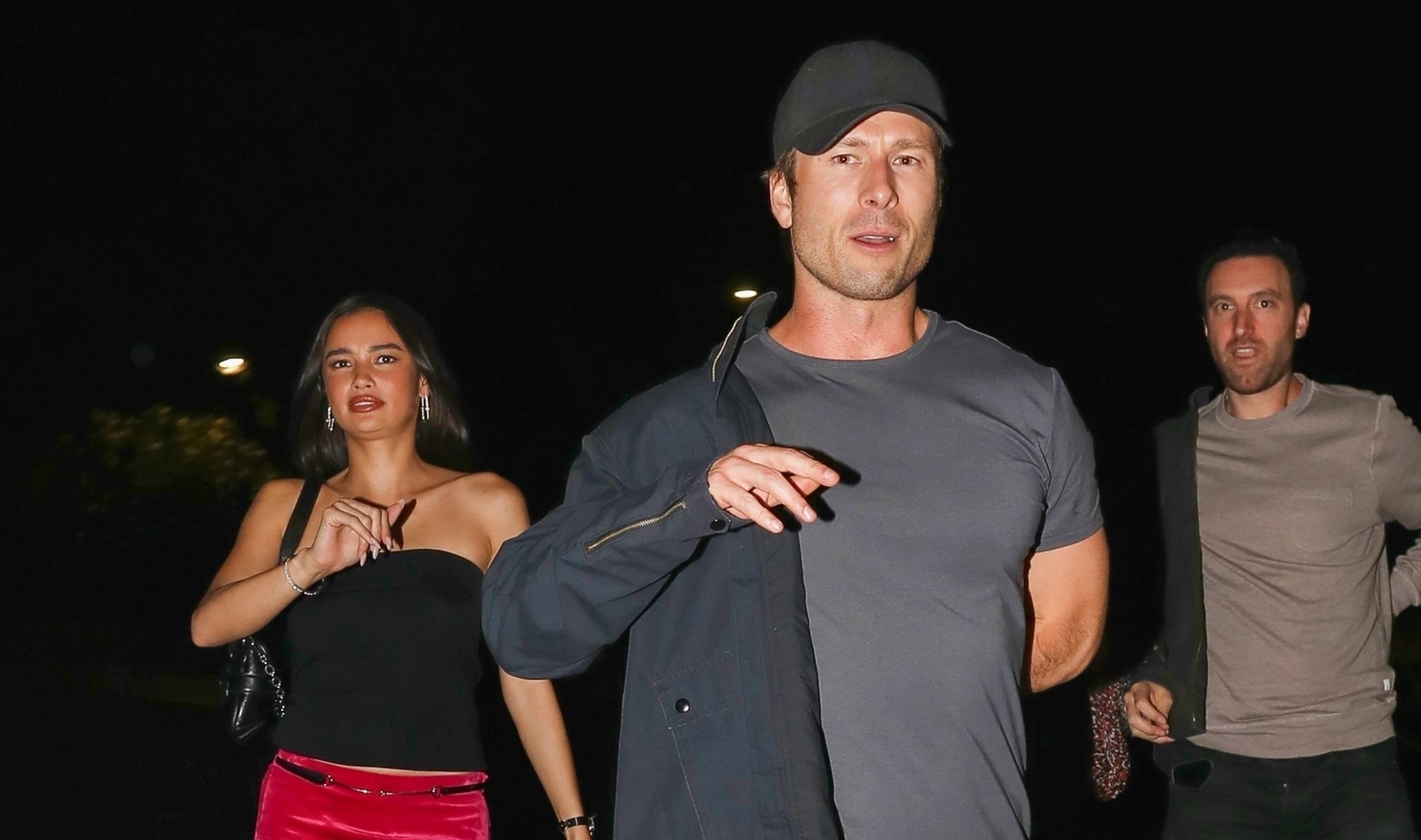 Glen Powell Spotted at Guns N’ Roses Concert with Model Kelsey Merritt