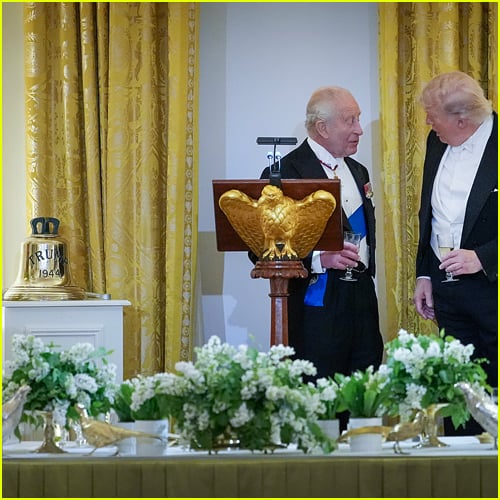 Donald Trump and King Charles speaking together during the state dinner with the HMS Trump bell in the left corner