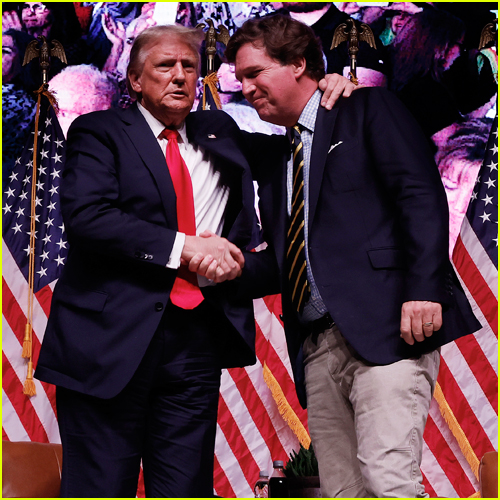 Donald Trump and Tucker Carlson shake hands